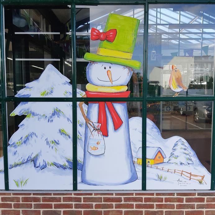 dessin de bonhomme de neige sur vitres