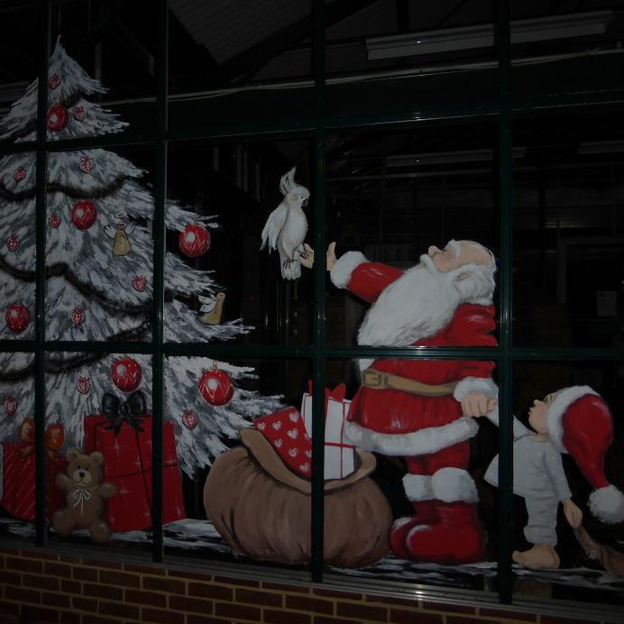 décoration artiste peintre sur vitres pour noël